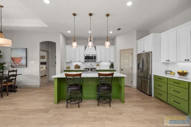 This stunning 3BR/2BA home offers a 2-car garage + a golf cart on South Padre Island Golf Club in Texas - for sale on GolfHomes.com, golf home, golf lot