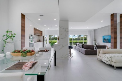 Golf and lake view gem in gated Doral Palms Estates! Enjoy on Jim McLean Signature Course in Florida - for sale on GolfHomes.com, golf home, golf lot