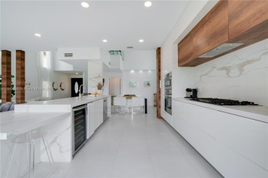 Golf and lake view gem in gated Doral Palms Estates! Enjoy on Jim McLean Signature Course in Florida - for sale on GolfHomes.com, golf home, golf lot