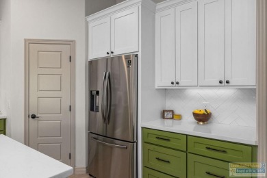 This stunning 3BR/2BA home offers a 2-car garage + a golf cart on South Padre Island Golf Club in Texas - for sale on GolfHomes.com, golf home, golf lot