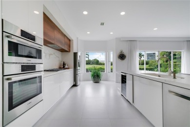 Golf and lake view gem in gated Doral Palms Estates! Enjoy on Jim McLean Signature Course in Florida - for sale on GolfHomes.com, golf home, golf lot