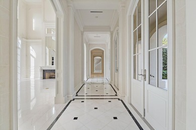 This timeless European Estate Home sits on 1.6 acres in the on The Bears Club in Florida - for sale on GolfHomes.com, golf home, golf lot