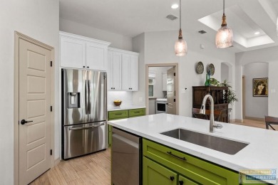 This stunning 3BR/2BA home offers a 2-car garage + a golf cart on South Padre Island Golf Club in Texas - for sale on GolfHomes.com, golf home, golf lot