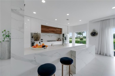 Golf and lake view gem in gated Doral Palms Estates! Enjoy on Jim McLean Signature Course in Florida - for sale on GolfHomes.com, golf home, golf lot