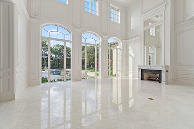 This timeless European Estate Home sits on 1.6 acres in the on The Bears Club in Florida - for sale on GolfHomes.com, golf home, golf lot
