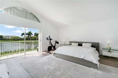 Golf and lake view gem in gated Doral Palms Estates! Enjoy on Jim McLean Signature Course in Florida - for sale on GolfHomes.com, golf home, golf lot