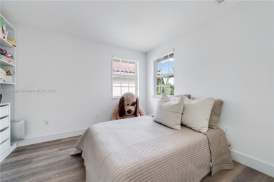 Golf and lake view gem in gated Doral Palms Estates! Enjoy on Jim McLean Signature Course in Florida - for sale on GolfHomes.com, golf home, golf lot