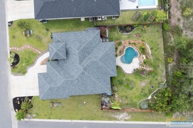 This stunning 3BR/2BA home offers a 2-car garage + a golf cart on South Padre Island Golf Club in Texas - for sale on GolfHomes.com, golf home, golf lot
