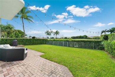 Golf and lake view gem in gated Doral Palms Estates! Enjoy on Jim McLean Signature Course in Florida - for sale on GolfHomes.com, golf home, golf lot