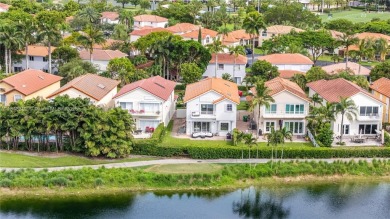 Golf and lake view gem in gated Doral Palms Estates! Enjoy on Jim McLean Signature Course in Florida - for sale on GolfHomes.com, golf home, golf lot
