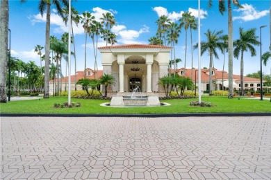 Golf and lake view gem in gated Doral Palms Estates! Enjoy on Jim McLean Signature Course in Florida - for sale on GolfHomes.com, golf home, golf lot