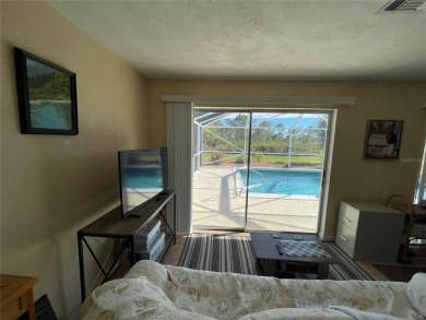 Peaceful pool home with preserve view! Nestled in a serene on Rotonda Golf and Country Club The Hills Course in Florida - for sale on GolfHomes.com, golf home, golf lot