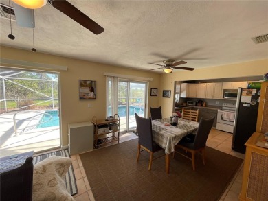 Peaceful pool home with preserve view! Nestled in a serene on Rotonda Golf and Country Club The Hills Course in Florida - for sale on GolfHomes.com, golf home, golf lot