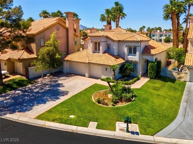 Enjoy expansive golf course views from bright, sun-filled on Canyon Gate Country Club in Nevada - for sale on GolfHomes.com, golf home, golf lot