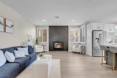 Enjoy expansive golf course views from bright, sun-filled on Canyon Gate Country Club in Nevada - for sale on GolfHomes.com, golf home, golf lot