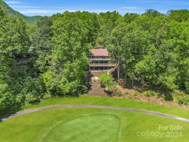 Nicely updated home, overlooking the 11th green of the Bald on Rumbling Bald Resort on Lake Lure in North Carolina - for sale on GolfHomes.com, golf home, golf lot