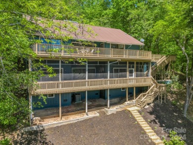 Nicely updated home, overlooking the 11th green of the Bald on Rumbling Bald Resort on Lake Lure in North Carolina - for sale on GolfHomes.com, golf home, golf lot