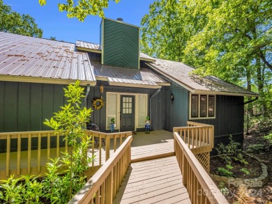 Nicely updated home, overlooking the 11th green of the Bald on Rumbling Bald Resort on Lake Lure in North Carolina - for sale on GolfHomes.com, golf home, golf lot