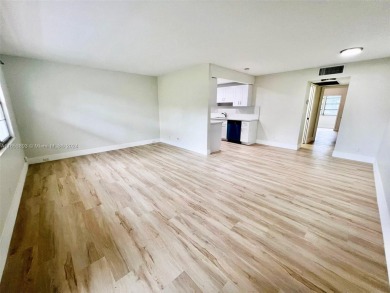 Welcome to a beautifully renovated apartment in the community of on Wynmoor Golf Course in Florida - for sale on GolfHomes.com, golf home, golf lot