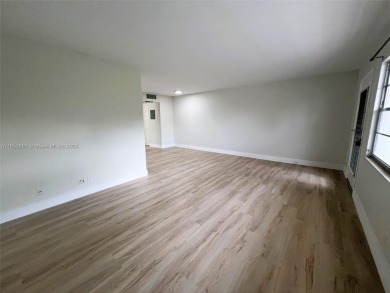 Welcome to a beautifully renovated apartment in the community of on Wynmoor Golf Course in Florida - for sale on GolfHomes.com, golf home, golf lot