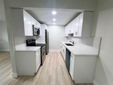 Welcome to a beautifully renovated apartment in the community of on Wynmoor Golf Course in Florida - for sale on GolfHomes.com, golf home, golf lot