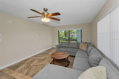 This Happy Home has been freshly updated to brand new!  Located on Countryside Country Club in Florida - for sale on GolfHomes.com, golf home, golf lot