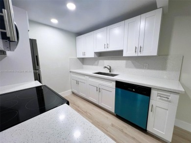 Welcome to a beautifully renovated apartment in the community of on Wynmoor Golf Course in Florida - for sale on GolfHomes.com, golf home, golf lot