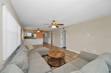 This Happy Home has been freshly updated to brand new!  Located on Countryside Country Club in Florida - for sale on GolfHomes.com, golf home, golf lot