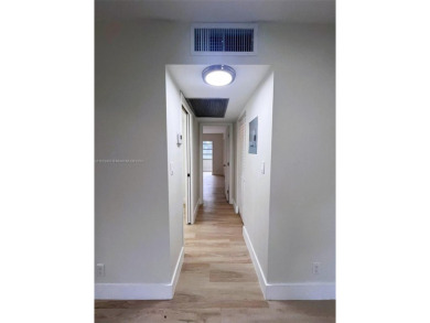 Welcome to a beautifully renovated apartment in the community of on Wynmoor Golf Course in Florida - for sale on GolfHomes.com, golf home, golf lot