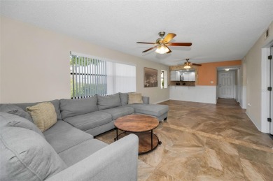 This Happy Home has been freshly updated to brand new!  Located on Countryside Country Club in Florida - for sale on GolfHomes.com, golf home, golf lot