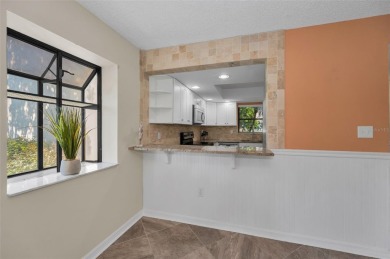 This Happy Home has been freshly updated to brand new!  Located on Countryside Country Club in Florida - for sale on GolfHomes.com, golf home, golf lot