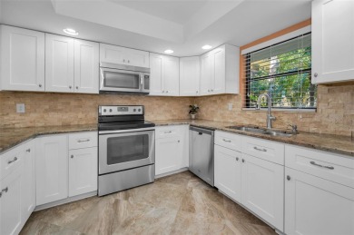 This Happy Home has been freshly updated to brand new!  Located on Countryside Country Club in Florida - for sale on GolfHomes.com, golf home, golf lot