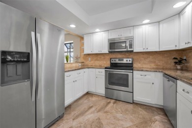 This Happy Home has been freshly updated to brand new!  Located on Countryside Country Club in Florida - for sale on GolfHomes.com, golf home, golf lot