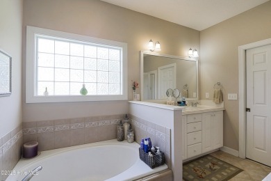 Situated in one of the area's premier golf course communities on Brunswick Plantation and Golf Resorts in North Carolina - for sale on GolfHomes.com, golf home, golf lot