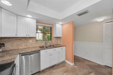 This Happy Home has been freshly updated to brand new!  Located on Countryside Country Club in Florida - for sale on GolfHomes.com, golf home, golf lot