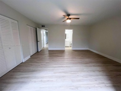 Welcome to a beautifully renovated apartment in the community of on Wynmoor Golf Course in Florida - for sale on GolfHomes.com, golf home, golf lot