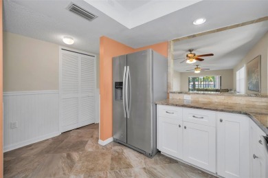 This Happy Home has been freshly updated to brand new!  Located on Countryside Country Club in Florida - for sale on GolfHomes.com, golf home, golf lot