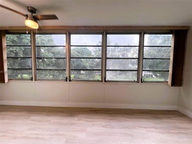 Welcome to a beautifully renovated apartment in the community of on Wynmoor Golf Course in Florida - for sale on GolfHomes.com, golf home, golf lot