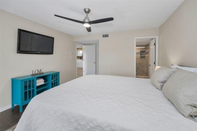 This Happy Home has been freshly updated to brand new!  Located on Countryside Country Club in Florida - for sale on GolfHomes.com, golf home, golf lot