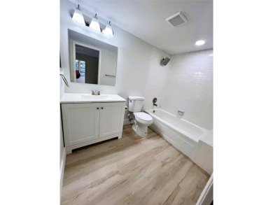 Welcome to a beautifully renovated apartment in the community of on Wynmoor Golf Course in Florida - for sale on GolfHomes.com, golf home, golf lot