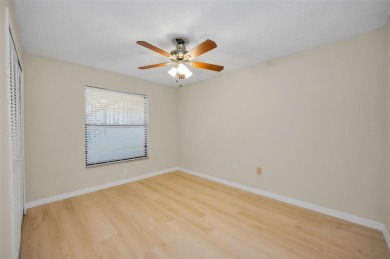 This Happy Home has been freshly updated to brand new!  Located on Countryside Country Club in Florida - for sale on GolfHomes.com, golf home, golf lot