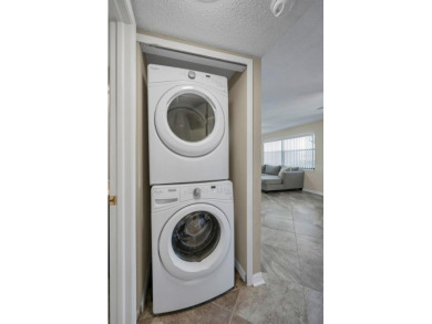 This Happy Home has been freshly updated to brand new!  Located on Countryside Country Club in Florida - for sale on GolfHomes.com, golf home, golf lot