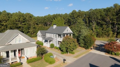 This charming Southern/Charleston-style two-story with double on Monroe Golf and Country Club in Georgia - for sale on GolfHomes.com, golf home, golf lot