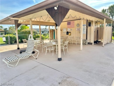 Discover the charm of this delightful 2-bedroom, 2-bathroom on Whiskey Creek Country Club in Florida - for sale on GolfHomes.com, golf home, golf lot