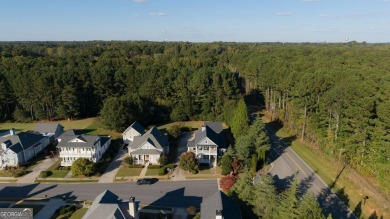 This charming Southern/Charleston-style two-story with double on Monroe Golf and Country Club in Georgia - for sale on GolfHomes.com, golf home, golf lot