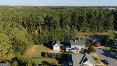 This charming Southern/Charleston-style two-story with double on Monroe Golf and Country Club in Georgia - for sale on GolfHomes.com, golf home, golf lot