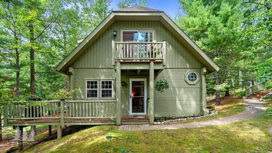 Tucked within the Garland Golf Resort, this beautifully updated on Garland Resort and Golf Club  in Michigan - for sale on GolfHomes.com, golf home, golf lot