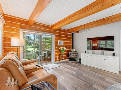 Tucked within the Garland Golf Resort, this beautifully updated on Garland Resort and Golf Club  in Michigan - for sale on GolfHomes.com, golf home, golf lot