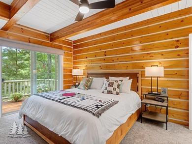 Tucked within the Garland Golf Resort, this beautifully updated on Garland Resort and Golf Club  in Michigan - for sale on GolfHomes.com, golf home, golf lot