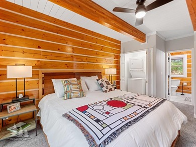 Tucked within the Garland Golf Resort, this beautifully updated on Garland Resort and Golf Club  in Michigan - for sale on GolfHomes.com, golf home, golf lot